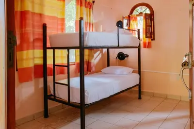 Cama o camas de una habitación en La Casona Hostel
