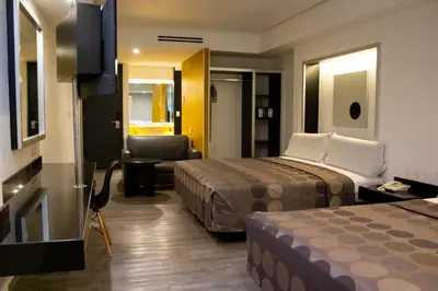 Cama o camas de una habitación en Hotel Harare