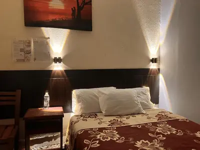 Cama o camas de una habitación en Hotel Santa Fe