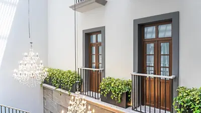 Un balcón o terraza de voco Royalty Puebla Downtown by IHG