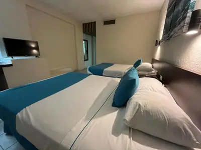 Cama o camas de una habitación en Howard Johnson by Wyndham Veracruz
