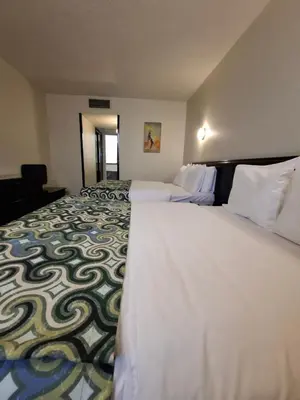 Cama o camas de una habitación en Aristos Puebla