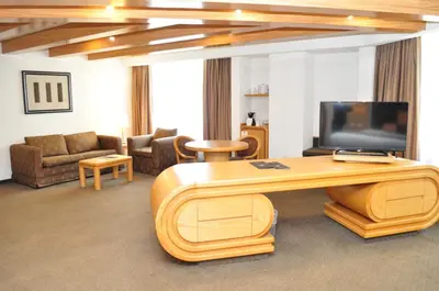 Una televisión o centro de entretenimiento en Royal Pedregal