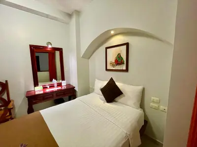 Cama o camas de una habitación en Hotel Puebla Plaza