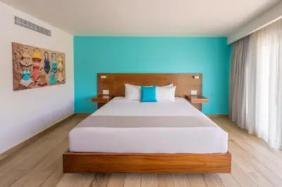 Cama o camas de una habitación en Hotel Amares Acapulco