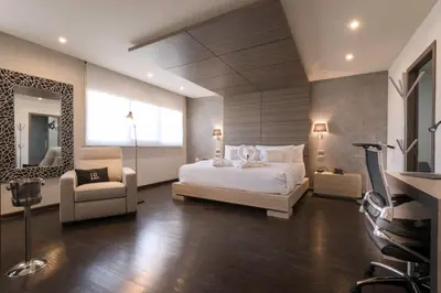 Cama o camas de una habitación en Hotel Riazor Aeropuerto