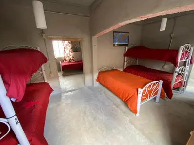Cama o camas de una habitación en Hostal Casa De Arcos