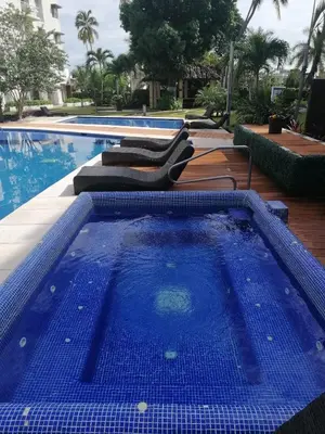 Piscina en o cerca de Departamento en condominio Diamante Turquesa
