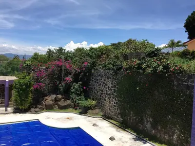 Piscina en o cerca de CASA MORADA 24 Personas alberca climatizada Burgos Cuernavaca