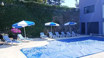 Piscina en o cerca de CASA MORADA 24 Personas alberca climatizada Burgos Cuernavaca