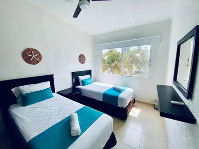 Cama o camas de una habitación en NUEVO EN BOOKING CASA TERRANIUM ACAPULCO DIAMANTE