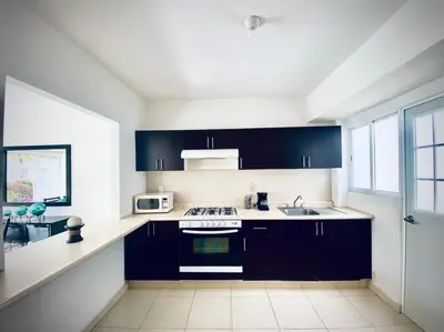 Una cocina o zona de cocina en NUEVO EN BOOKING CASA TERRANIUM ACAPULCO DIAMANTE