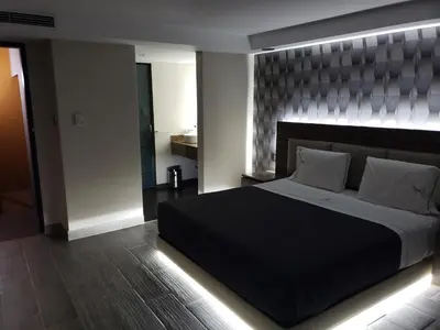 Cama o camas de una habitación en Motel Nuevo Tijuana