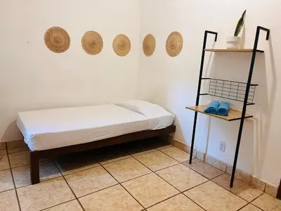 Cama o camas de una habitación en Casa Karma