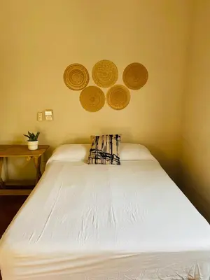 Cama o camas de una habitación en Casa Karma