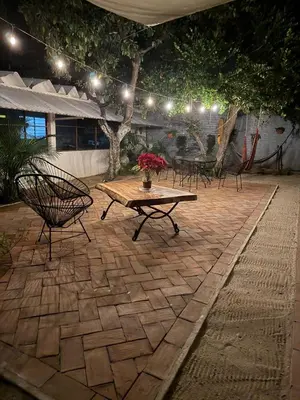 Jardín al aire libre en Casa Sixta a 7min del aeropuerto internacional PMX y 2 cuadras terminal autob ADO