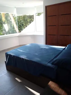 Cama o camas de una habitación en La Villa de Almudena