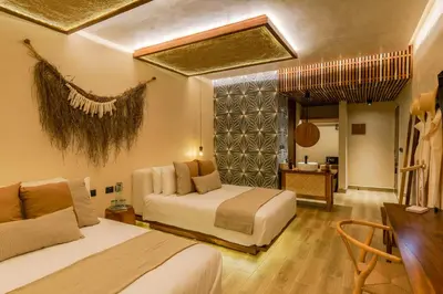 Cama o camas de una habitación en Xkan Hotel Boutique - Adults Only