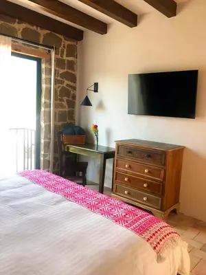Cama o camas de una habitación en Hotel Casa Xaa
