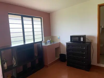 Una cocina o zona de cocina en Departamento con gran área verde