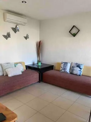 Zona de estar de Acapulco Marina diamante departamento con alberca y club náutico