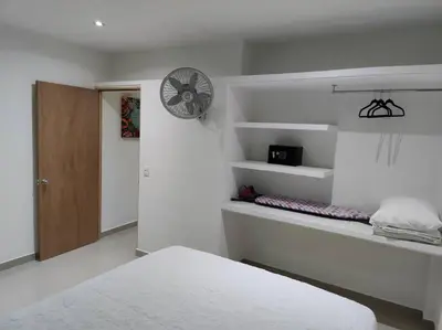 Cama o camas de una habitación en Naranja Departamento 33 M2 nuevo