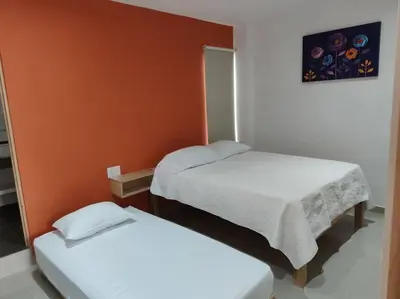 Cama o camas de una habitación en Naranja Departamento 33 M2 nuevo