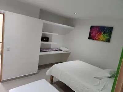 Cama o camas de una habitación en Verde Departamento 33 M2 Nuevo