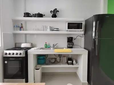 Una cocina o zona de cocina en Verde Departamento 33 M2 Nuevo