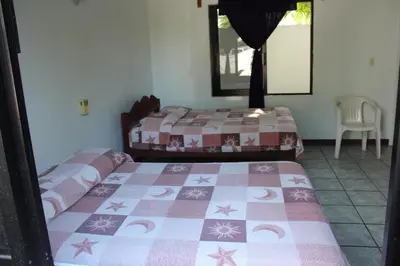 Cama o camas de una habitación en Hotel Palmarito
