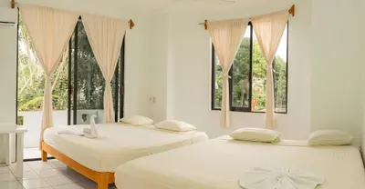Cama o camas de una habitación en Hotel Palmarito