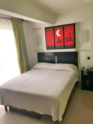 Cama o camas de una habitación en Hotel Ruah