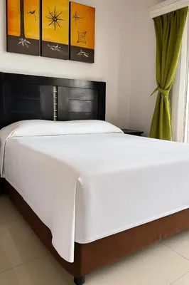 Cama o camas de una habitación en Hotel Ruah