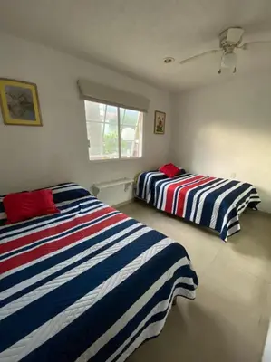 Cama o camas de una habitación en Depa de Dos recamaras en ACAPULCO DIAMANTE frente ARENA GNP