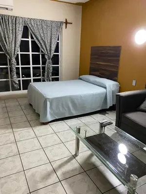 Cama o camas de una habitación en Hotel Casa Juanita