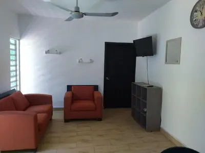 Zona de estar de Garden Suites Comalcalco