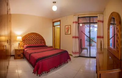 Cama o camas de una habitación en Casa del Barrio Apartments Oaxaca
