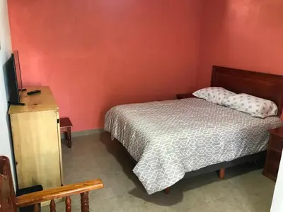 Cama o camas de una habitación en Casa alebrijes