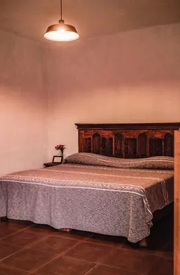 Cama o camas de una habitación en Hospedaje Casa Teotleco