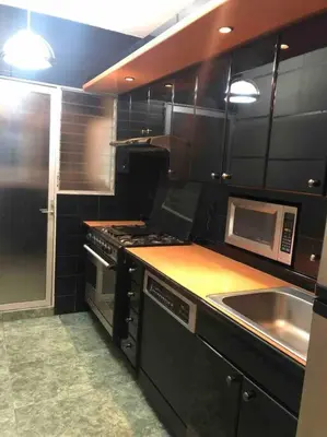 Una cocina o zona de cocina en Sexto piso y vista al mar