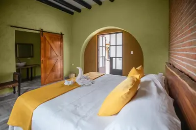 Cama o camas de una habitación en Hacienda Gamboa