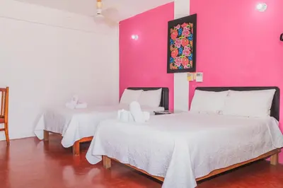 Cama o camas de una habitación en Hotel Doña Mary Huatulco