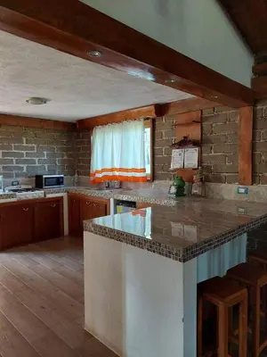 Una cocina o zona de cocina en cabaña el rio la grande