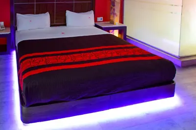 Cama o camas de una habitación en Plutarco Suites