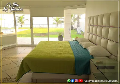 Cama o camas de una habitación en Villa la Ilusión Casa Vacacional