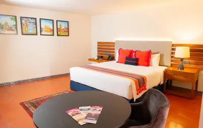 Cama o camas de una habitación en Casa Azulai Puebla Hotel Boutique