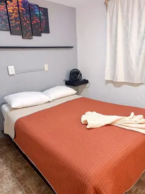 Cama o camas de una habitación en Casita del Árbol