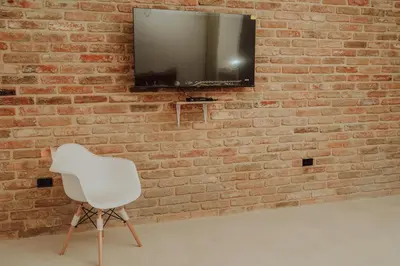Una televisión o centro de entretenimiento en Villas Colón 18
