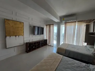 Cama o camas de una habitación en Casa Blanca Grand