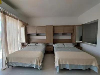 Cama o camas de una habitación en Casa Blanca Grand